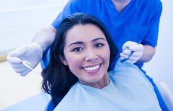 smiling woman during the dentist checkup