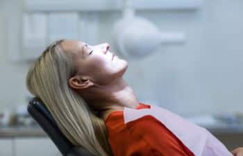 woman relaxing on the dentist chair