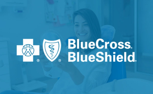 BlueCross BlueShield logo with healthcare professional in dental office background