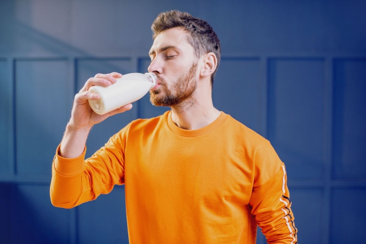 man drinking milk for healthy teeth